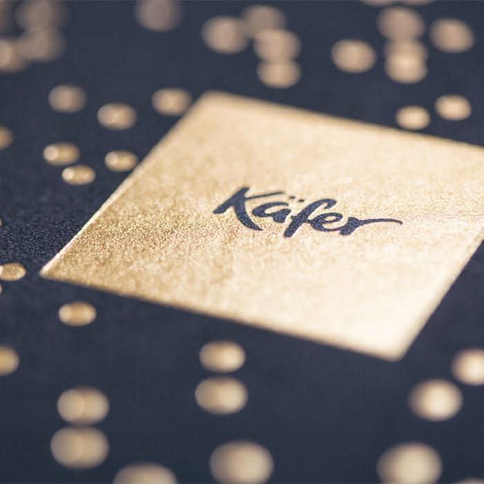 Geschenkbox mit Käfer Crémant Brut und Pralinen -